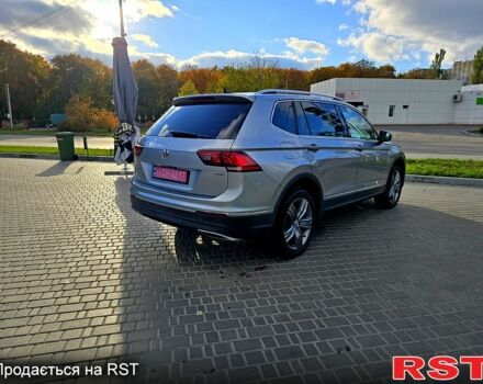 Сірий Фольксваген Тігуан, об'ємом двигуна 2 л та пробігом 147 тис. км за 21950 $, фото 6 на Automoto.ua