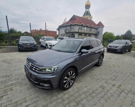 Серый Фольксваген Тигуан, объемом двигателя 2 л и пробегом 214 тыс. км за 21800 $, фото 1 на Automoto.ua