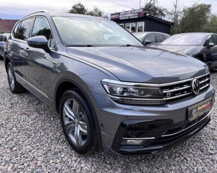 Серый Фольксваген Тигуан, объемом двигателя 2 л и пробегом 100 тыс. км за 24999 $, фото 2 на Automoto.ua