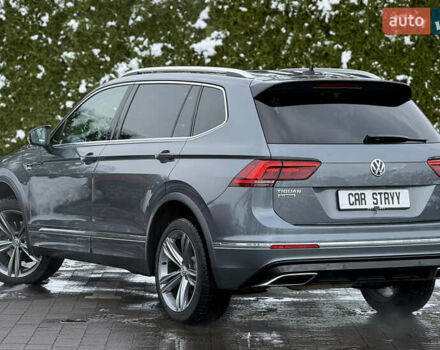 Серый Фольксваген Тигуан, объемом двигателя 2 л и пробегом 241 тыс. км за 26999 $, фото 2 на Automoto.ua