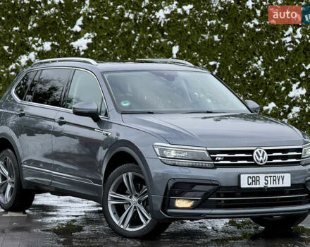 Серый Фольксваген Тигуан, объемом двигателя 2 л и пробегом 241 тыс. км за 26999 $, фото 1 на Automoto.ua