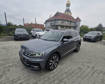 Серый Фольксваген Тигуан, объемом двигателя 2 л и пробегом 213 тыс. км за 21800 $, фото 2 на Automoto.ua