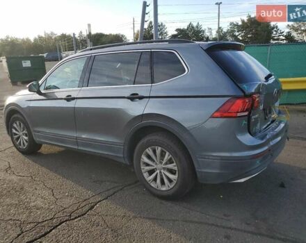 Сірий Фольксваген Тігуан, об'ємом двигуна 2 л та пробігом 154 тис. км за 4800 $, фото 1 на Automoto.ua