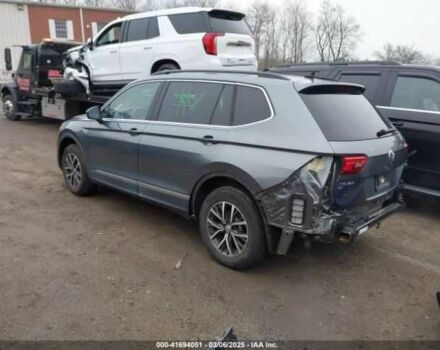 Серый Фольксваген Тигуан, объемом двигателя 2 л и пробегом 59 тыс. км за 4000 $, фото 2 на Automoto.ua