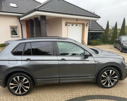 Сірий Фольксваген Тігуан, об'ємом двигуна 2 л та пробігом 55 тис. км за 19000 $, фото 4 на Automoto.ua