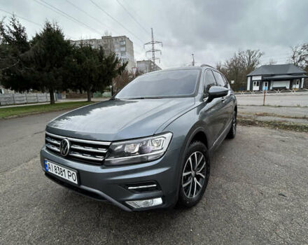 Сірий Фольксваген Тігуан, об'ємом двигуна 1.98 л та пробігом 128 тис. км за 18700 $, фото 1 на Automoto.ua
