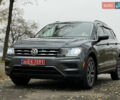 Сірий Фольксваген Тігуан, об'ємом двигуна 2 л та пробігом 212 тис. км за 16900 $, фото 1 на Automoto.ua