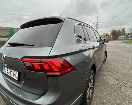 Сірий Фольксваген Тігуан, об'ємом двигуна 1.98 л та пробігом 128 тис. км за 18700 $, фото 5 на Automoto.ua