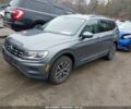 Серый Фольксваген Тигуан, объемом двигателя 2 л и пробегом 59 тыс. км за 4000 $, фото 1 на Automoto.ua