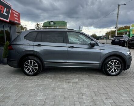 Сірий Фольксваген Тігуан, об'ємом двигуна 2 л та пробігом 97 тис. км за 19900 $, фото 2 на Automoto.ua