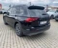 Сірий Фольксваген Тігуан, об'ємом двигуна 2 л та пробігом 131 тис. км за 19500 $, фото 4 на Automoto.ua