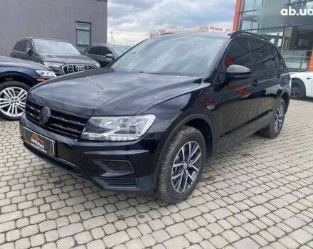 Сірий Фольксваген Тігуан, об'ємом двигуна 2 л та пробігом 131 тис. км за 19500 $, фото 2 на Automoto.ua