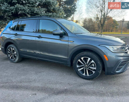 Сірий Фольксваген Тігуан, об'ємом двигуна 2 л та пробігом 77 тис. км за 19899 $, фото 4 на Automoto.ua