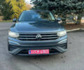 Сірий Фольксваген Тігуан, об'ємом двигуна 2 л та пробігом 77 тис. км за 19899 $, фото 2 на Automoto.ua