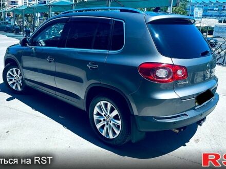 Сірий Фольксваген Тігуан, об'ємом двигуна 2 л та пробігом 201 тис. км за 11900 $, фото 1 на Automoto.ua
