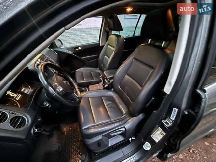 Сірий Фольксваген Тігуан, об'ємом двигуна 2 л та пробігом 282 тис. км за 10000 $, фото 1 на Automoto.ua