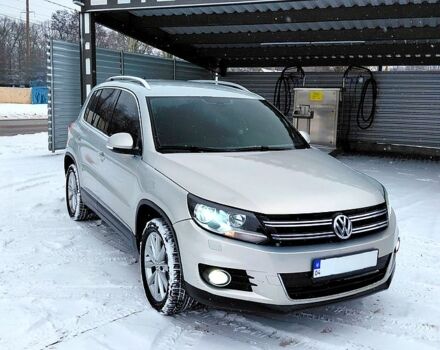 Сірий Фольксваген Тігуан, об'ємом двигуна 2 л та пробігом 212 тис. км за 14000 $, фото 1 на Automoto.ua