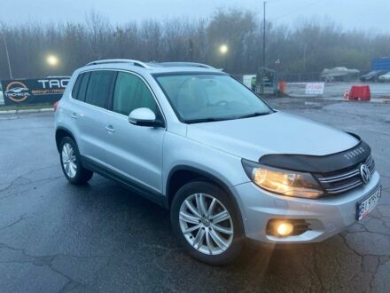 Серый Фольксваген Тигуан, объемом двигателя 2 л и пробегом 176 тыс. км за 10999 $, фото 1 на Automoto.ua