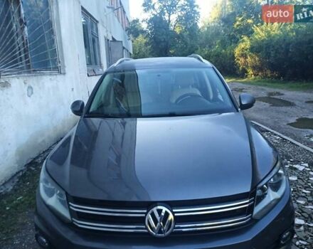 Серый Фольксваген Тигуан, объемом двигателя 2 л и пробегом 150 тыс. км за 11000 $, фото 1 на Automoto.ua