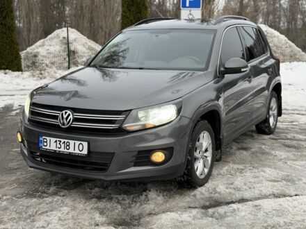 Сірий Фольксваген Тігуан, об'ємом двигуна 2 л та пробігом 200 тис. км за 9299 $, фото 1 на Automoto.ua