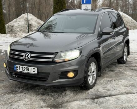 Сірий Фольксваген Тігуан, об'ємом двигуна 2 л та пробігом 200 тис. км за 9299 $, фото 1 на Automoto.ua