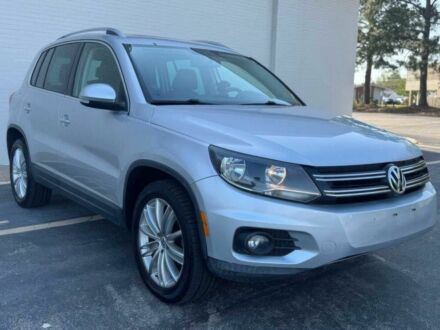 Сірий Фольксваген Тігуан, об'ємом двигуна 2 л та пробігом 98 тис. км за 7200 $, фото 1 на Automoto.ua
