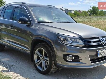 Сірий Фольксваген Тігуан, об'ємом двигуна 2 л та пробігом 155 тис. км за 19900 $, фото 1 на Automoto.ua