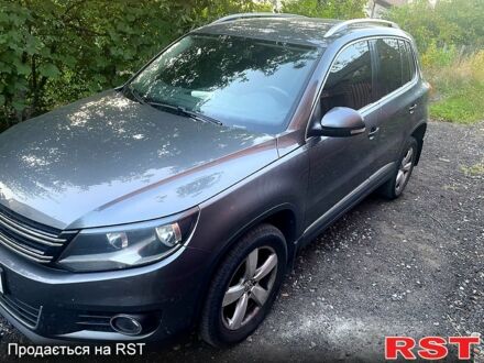 Серый Фольксваген Тигуан, объемом двигателя 2 л и пробегом 159 тыс. км за 16000 $, фото 1 на Automoto.ua