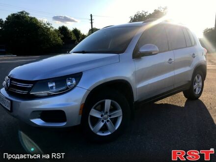 Сірий Фольксваген Тігуан, об'ємом двигуна 2 л та пробігом 170 тис. км за 12500 $, фото 1 на Automoto.ua