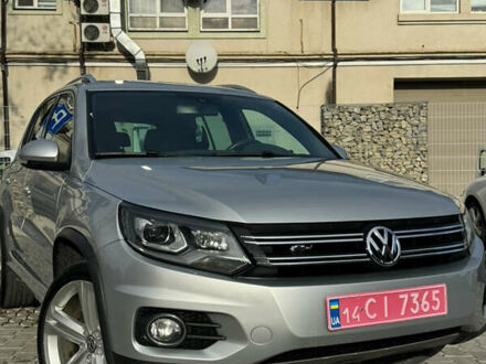 Сірий Фольксваген Тігуан, об'ємом двигуна 2 л та пробігом 175 тис. км за 12750 $, фото 1 на Automoto.ua