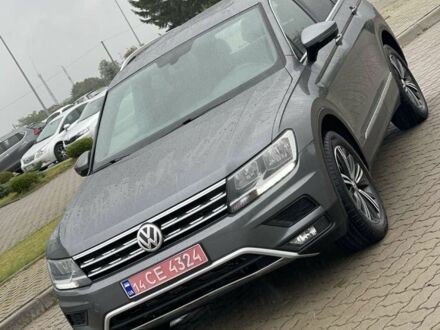 Сірий Фольксваген Тігуан, об'ємом двигуна 2 л та пробігом 135 тис. км за 15700 $, фото 1 на Automoto.ua