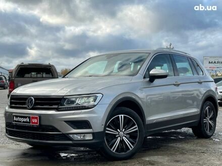 Серый Фольксваген Тигуан, объемом двигателя 2 л и пробегом 250 тыс. км за 22680 $, фото 1 на Automoto.ua