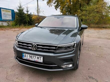 Серый Фольксваген Тигуан, объемом двигателя 2 л и пробегом 176 тыс. км за 23800 $, фото 1 на Automoto.ua