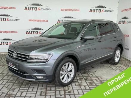 Сірий Фольксваген Тігуан, об'ємом двигуна 2 л та пробігом 155 тис. км за 28450 $, фото 1 на Automoto.ua