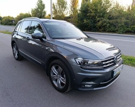 Серый Фольксваген Тигуан, объемом двигателя 2 л и пробегом 180 тыс. км за 30000 $, фото 1 на Automoto.ua