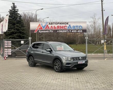 Серый Фольксваген Тигуан, объемом двигателя 2 л и пробегом 210 тыс. км за 14999 $, фото 1 на Automoto.ua