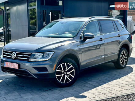 Серый Фольксваген Тигуан, объемом двигателя 2 л и пробегом 122 тыс. км за 17488 $, фото 1 на Automoto.ua