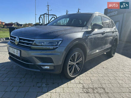 Серый Фольксваген Тигуан, объемом двигателя 2 л и пробегом 212 тыс. км за 26500 $, фото 1 на Automoto.ua
