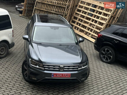 Серый Фольксваген Тигуан, объемом двигателя 2 л и пробегом 135 тыс. км за 18900 $, фото 1 на Automoto.ua