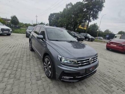 Серый Фольксваген Тигуан, объемом двигателя 2 л и пробегом 213 тыс. км за 21800 $, фото 1 на Automoto.ua