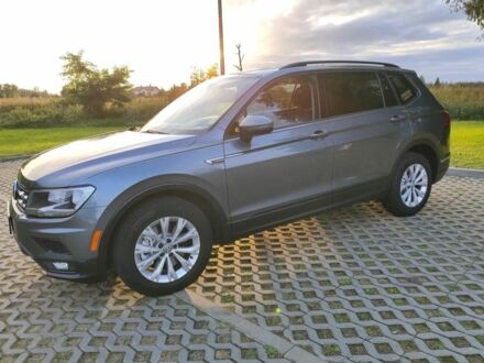 Серый Фольксваген Тигуан, объемом двигателя 2 л и пробегом 140 тыс. км за 9700 $, фото 1 на Automoto.ua