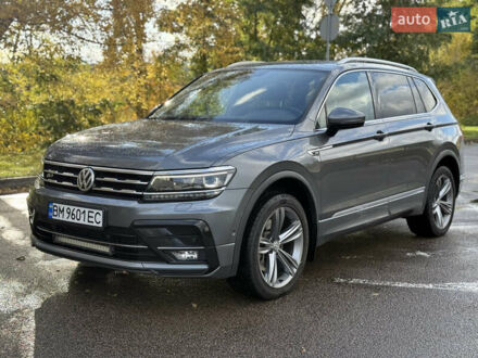 Серый Фольксваген Тигуан, объемом двигателя 2 л и пробегом 295 тыс. км за 25900 $, фото 1 на Automoto.ua