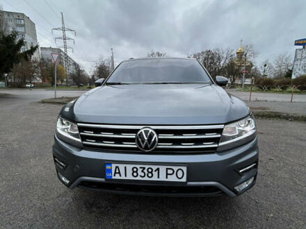 Серый Фольксваген Тигуан, объемом двигателя 1.98 л и пробегом 128 тыс. км за 18700 $, фото 1 на Automoto.ua