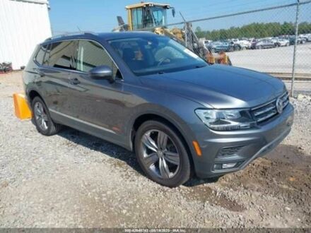 Серый Фольксваген Тигуан, объемом двигателя 2 л и пробегом 42 тыс. км за 5500 $, фото 1 на Automoto.ua