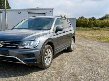 Серый Фольксваген Тигуан, объемом двигателя 2 л и пробегом 98 тыс. км за 9800 $, фото 1 на Automoto.ua