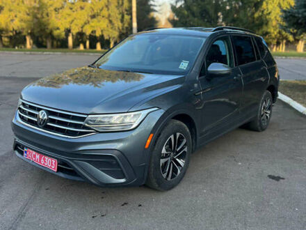 Сірий Фольксваген Тігуан, об'ємом двигуна 2 л та пробігом 77 тис. км за 19899 $, фото 1 на Automoto.ua