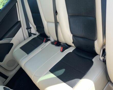 Синій Фольксваген Тігуан, об'ємом двигуна 2 л та пробігом 179 тис. км за 9800 $, фото 4 на Automoto.ua