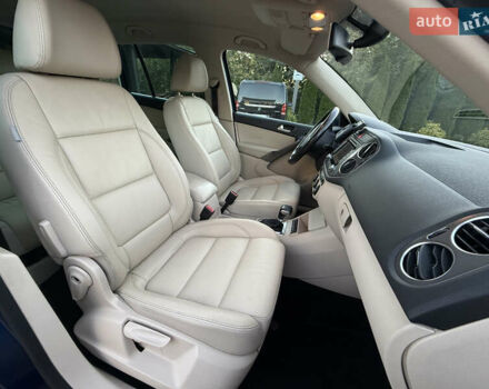 Синій Фольксваген Тігуан, об'ємом двигуна 2 л та пробігом 158 тис. км за 10999 $, фото 31 на Automoto.ua