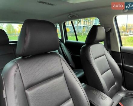 Синий Фольксваген Тигуан, объемом двигателя 2 л и пробегом 278 тыс. км за 8490 $, фото 56 на Automoto.ua