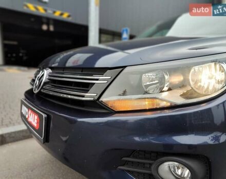 Синий Фольксваген Тигуан, объемом двигателя 2 л и пробегом 278 тыс. км за 8490 $, фото 1 на Automoto.ua